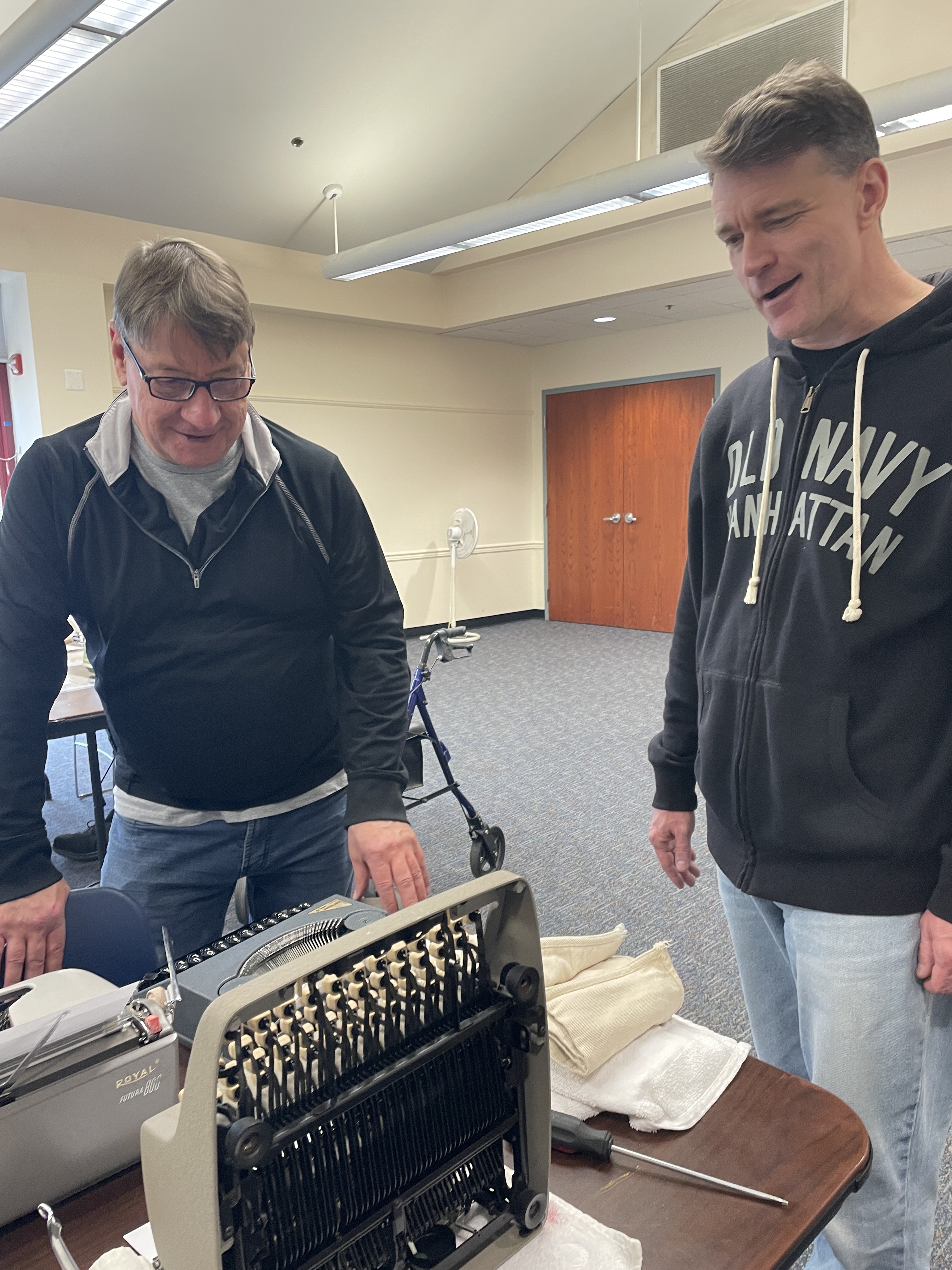 Stephen B, her husband and co-host of the type-in, discuss a misbehaving Royal QDL with Ross L., another local typospherian.