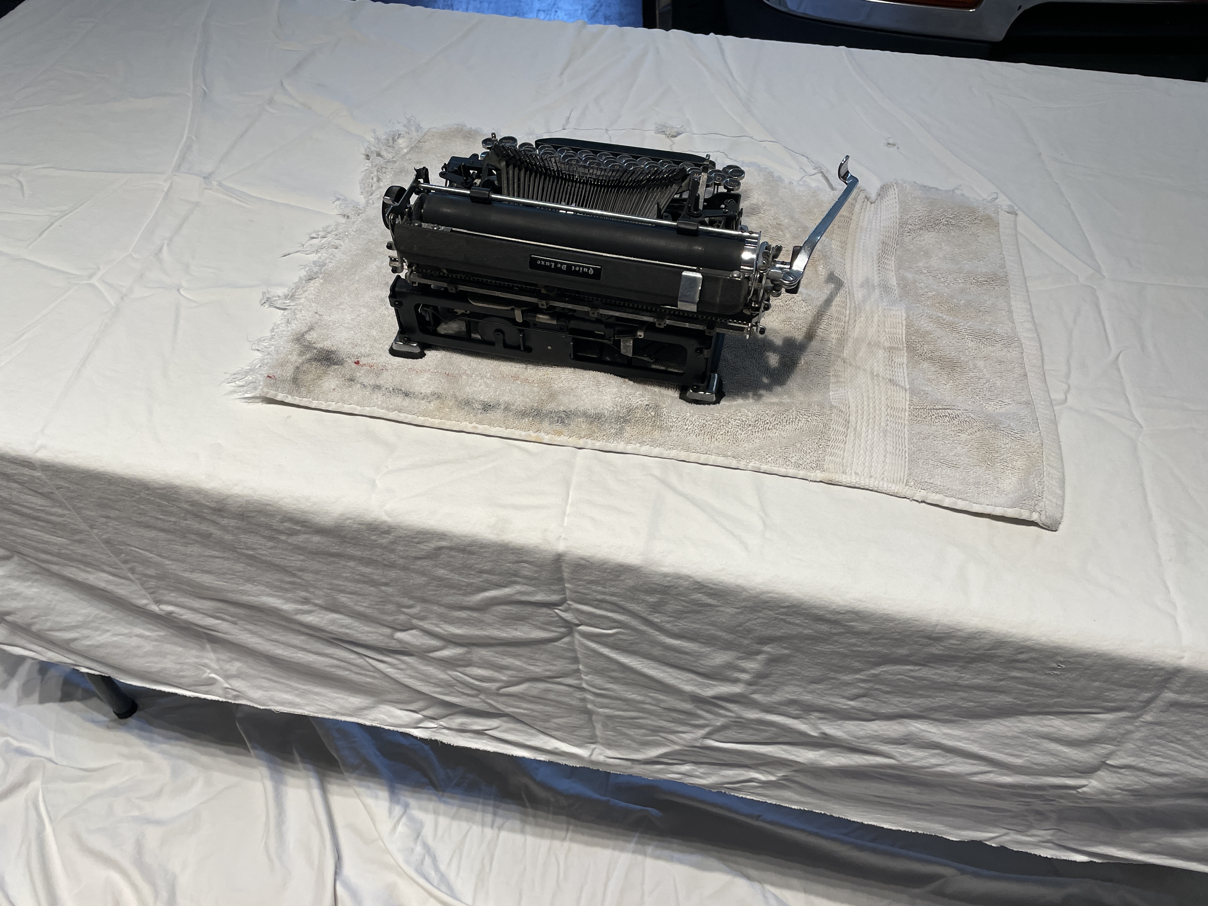 Typewriter on white sheet for repair
