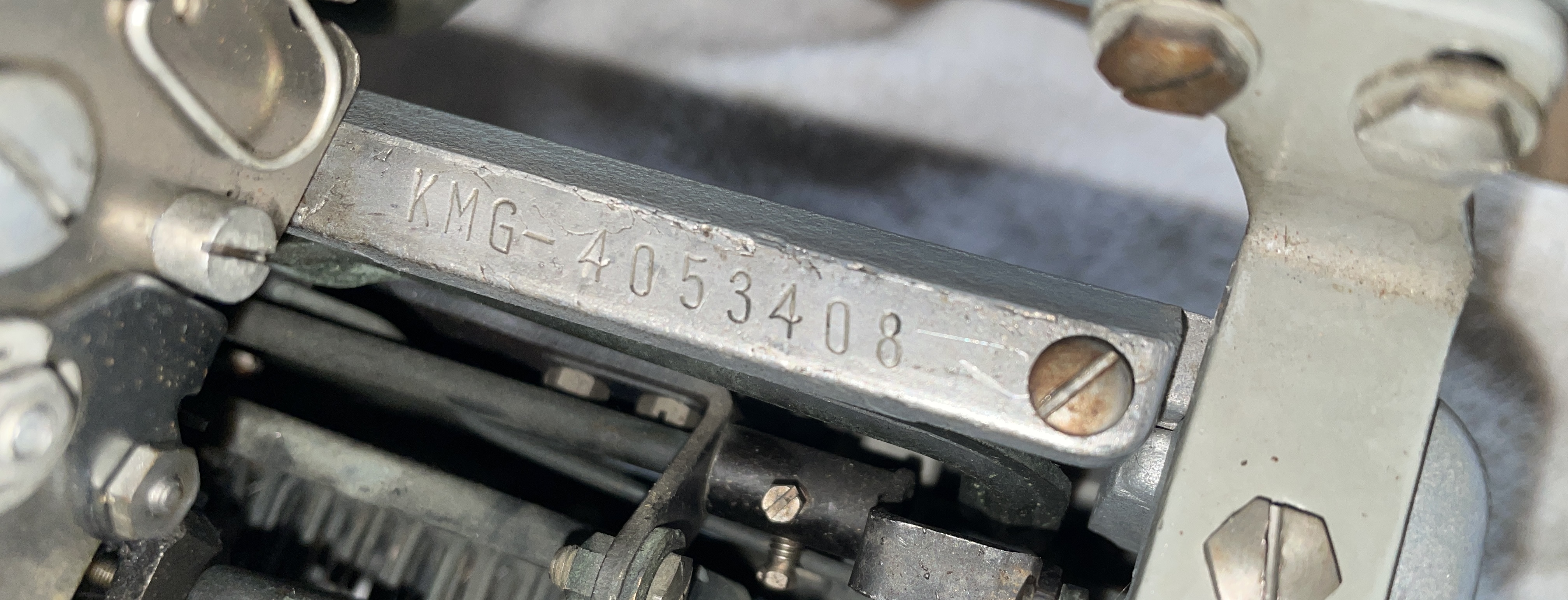 Royal KMG typewriter serial number is located behind the carriage on the right