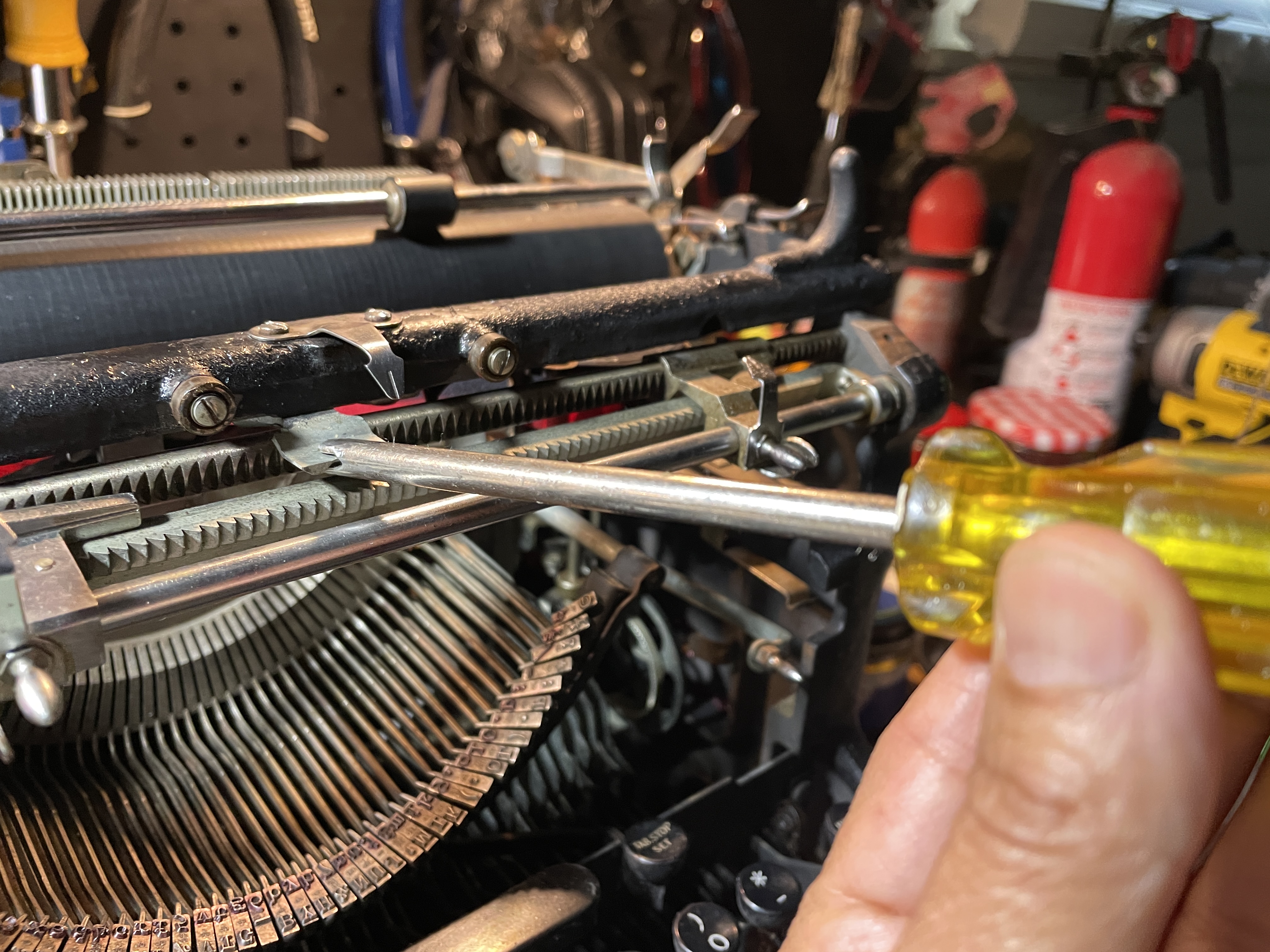 forming bell trip adjuster