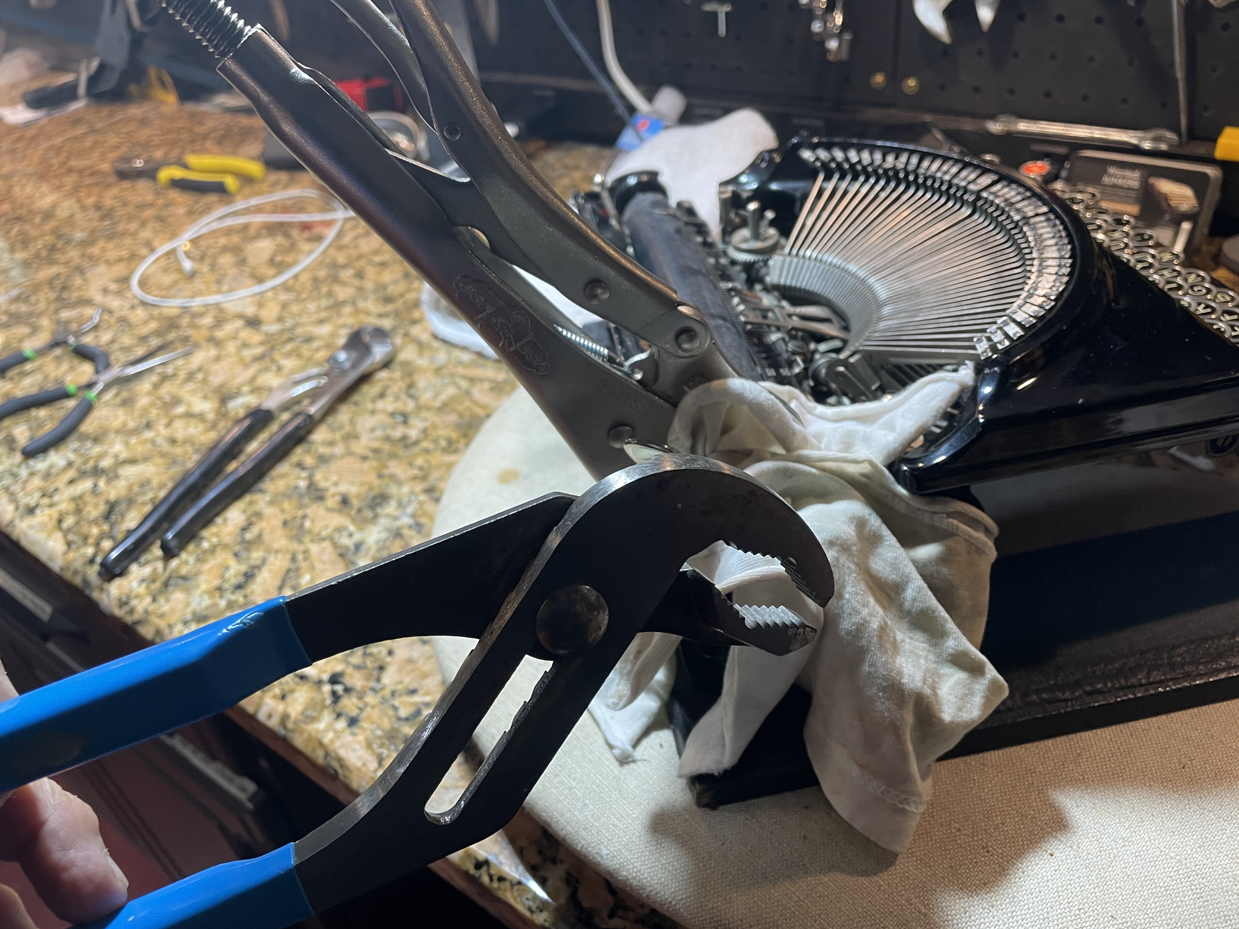 1934 Remington Portable Model 5 typewriter - removing the platen with vise grips and channel lock pliers
