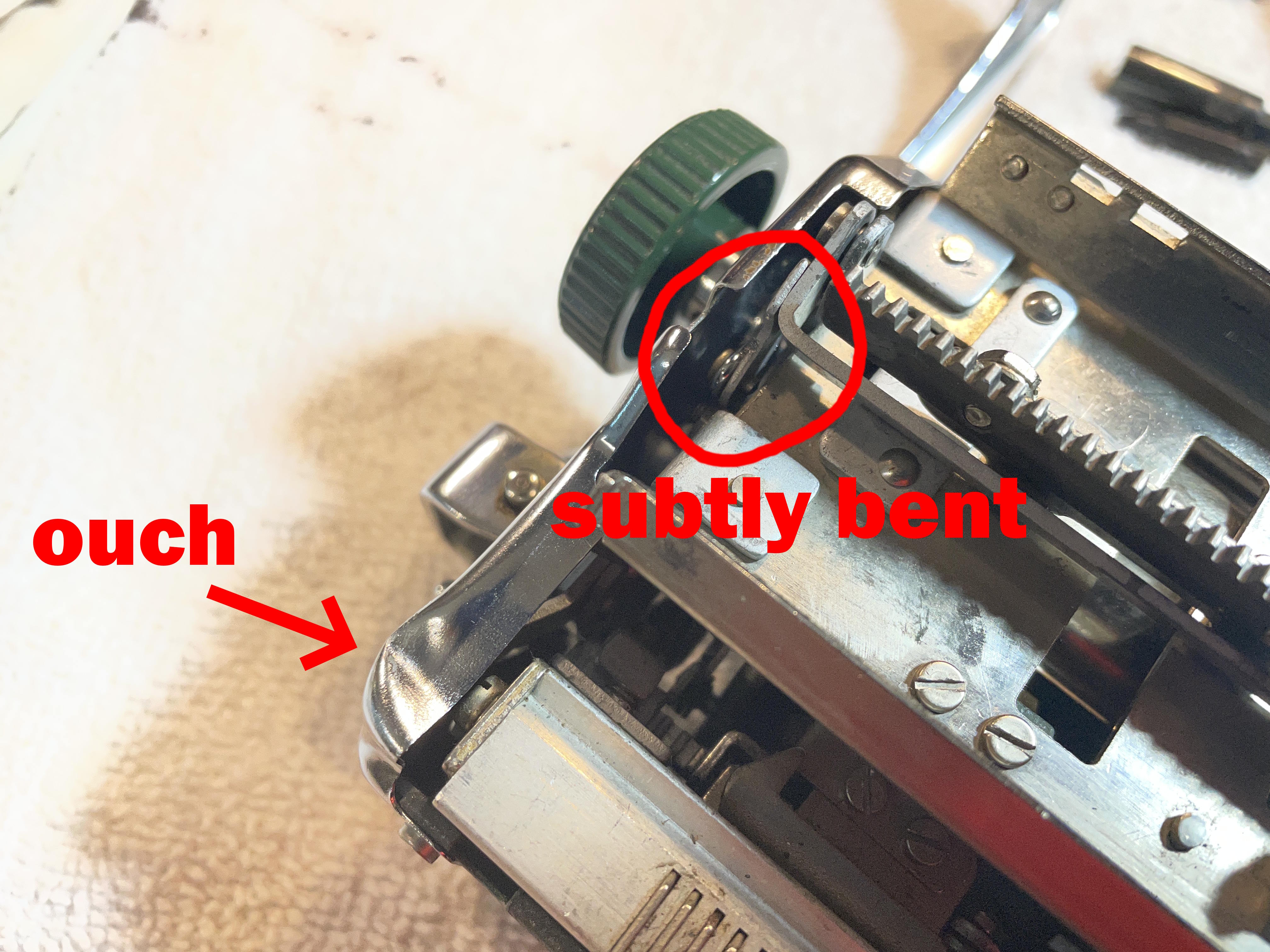 Subtly bent left carriage release arm on an Olympia SM4