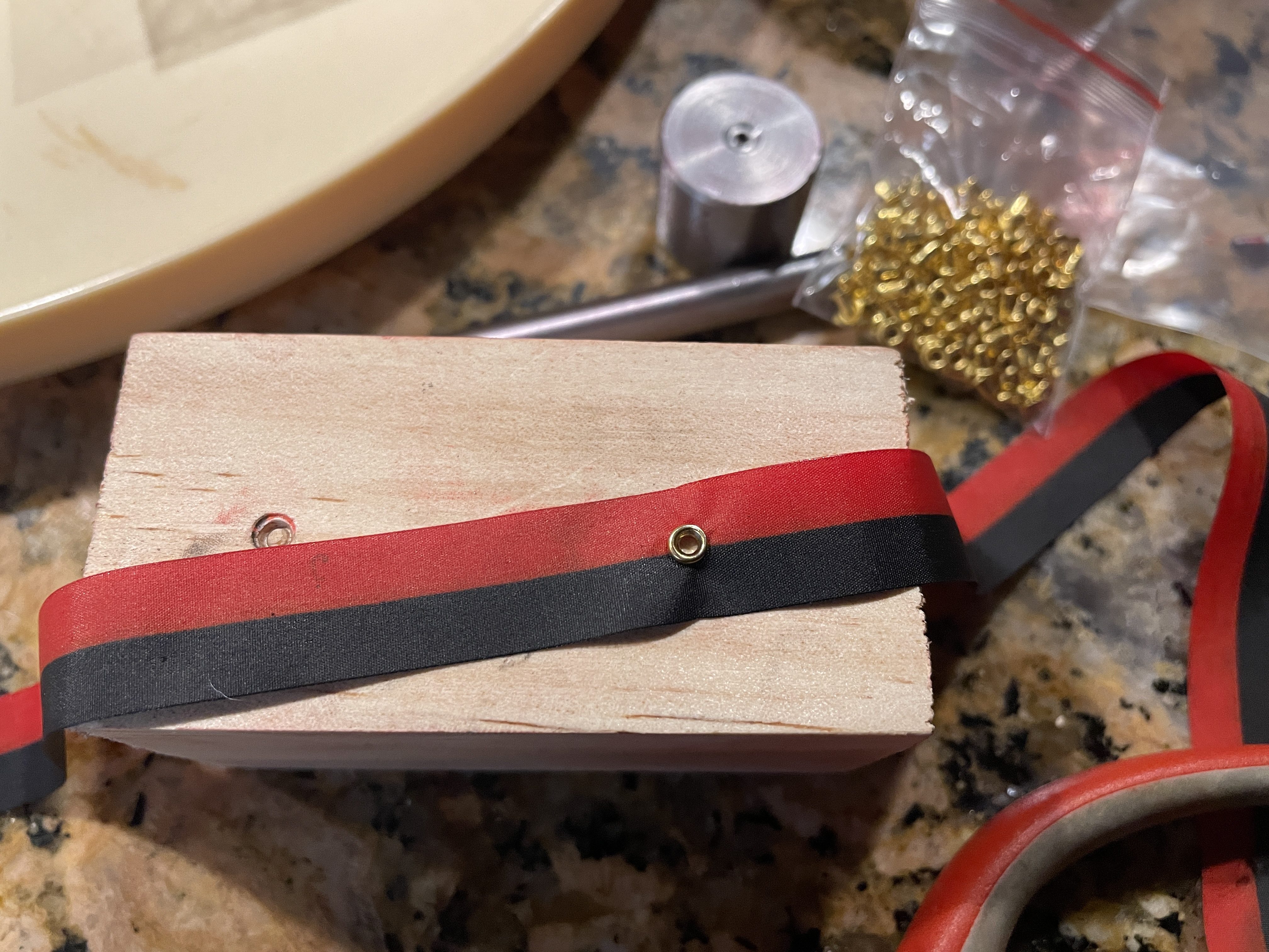 Small eyelets for typewriter ribbon
