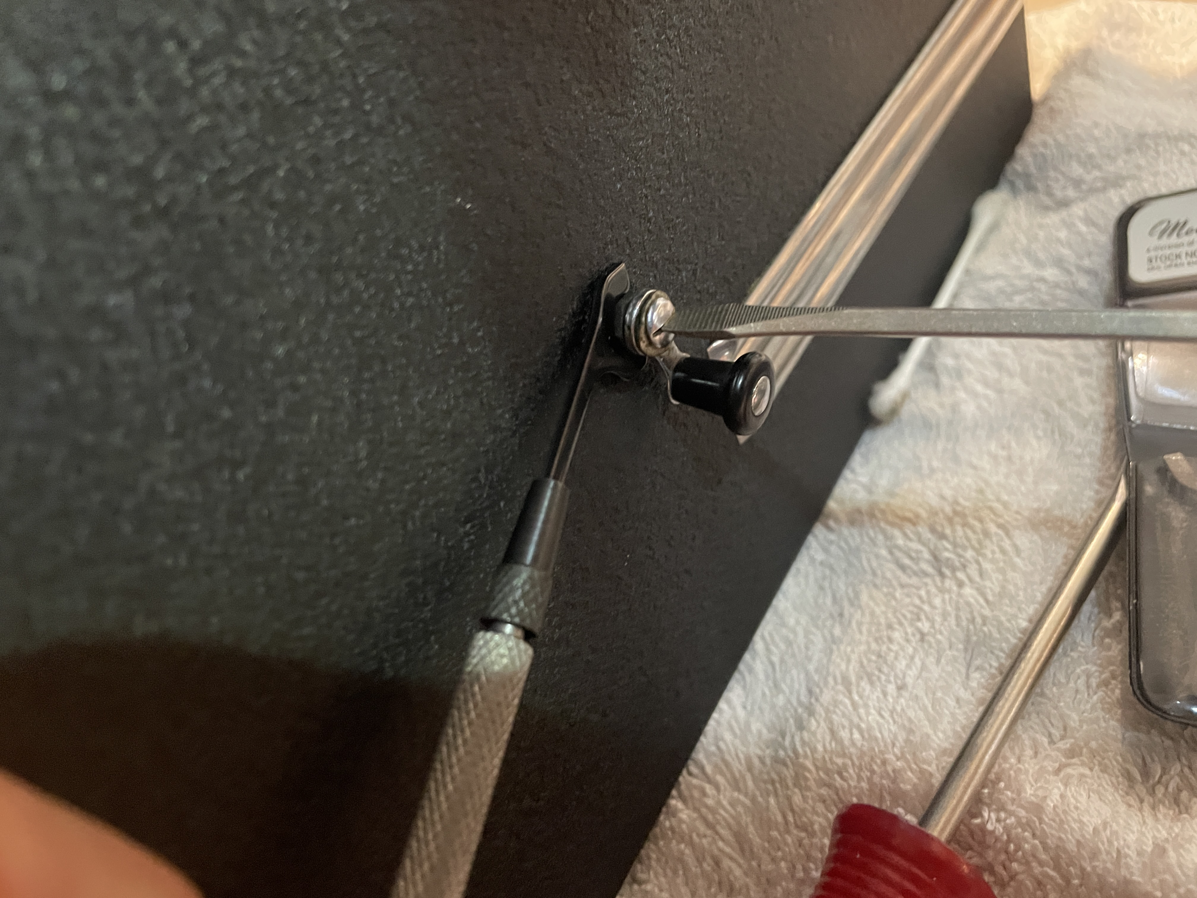 removed winding arm with 1/4" open end wrench and and screwdriver