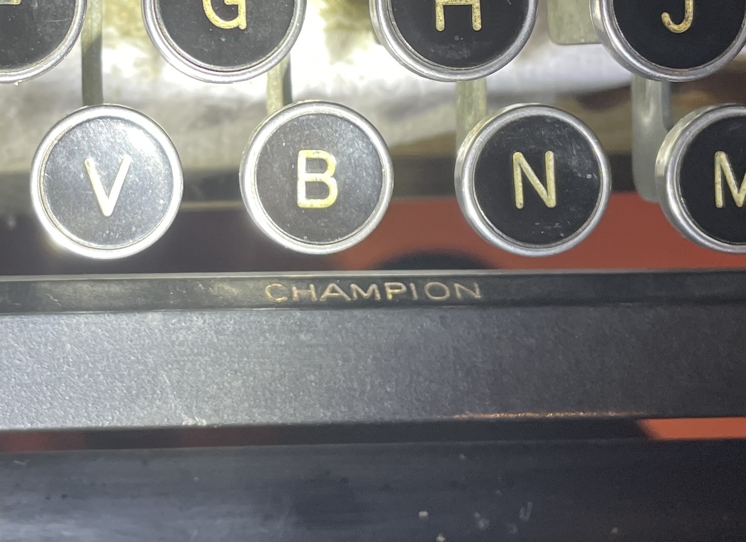 Inside space bar of Underwood Master typewriter, it say "Champion"