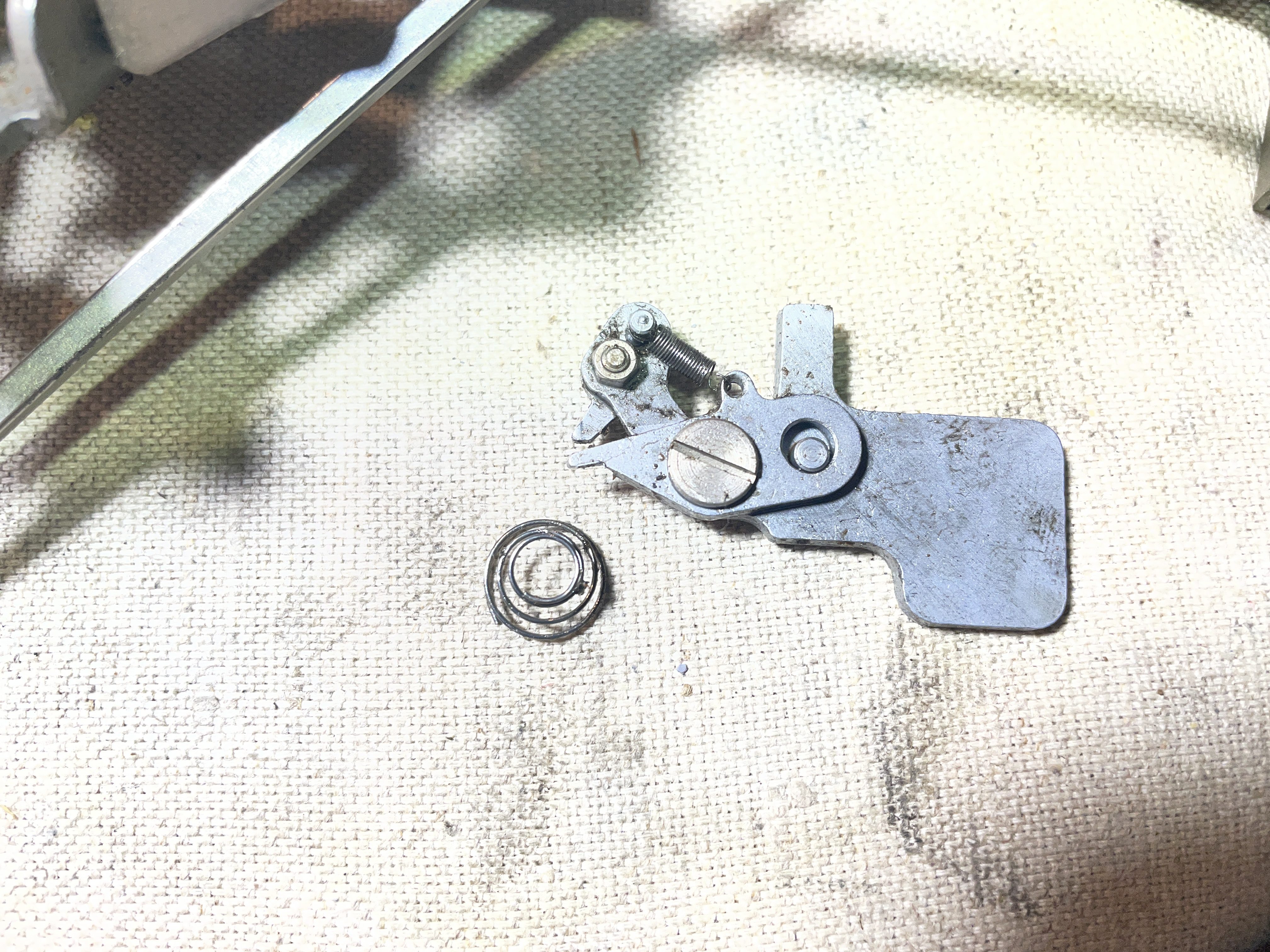 escapement rocker and spring from 1958 Remington Quiet-Riter typewriter