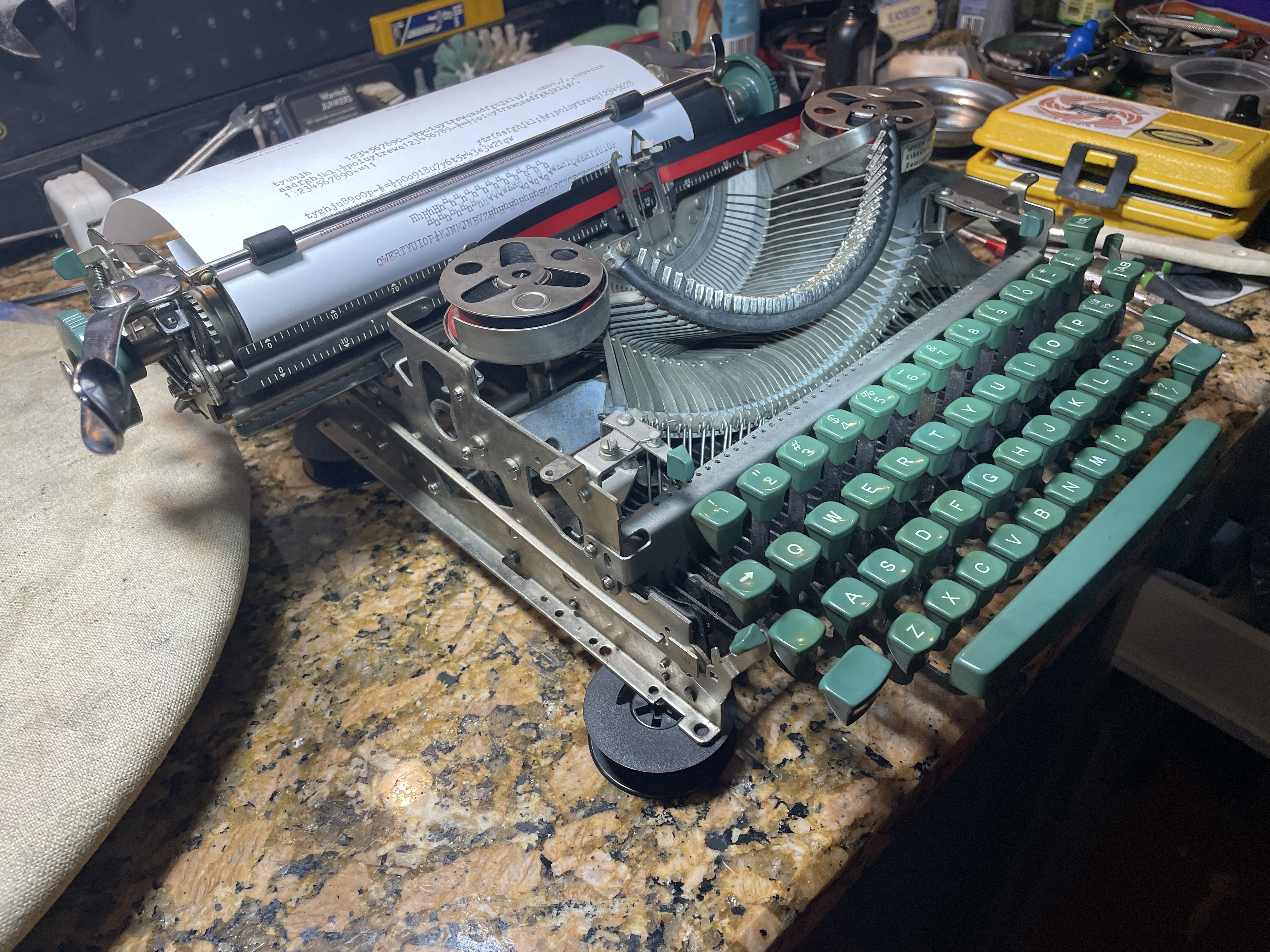 position typewriter on spools when adjustment shift/motion