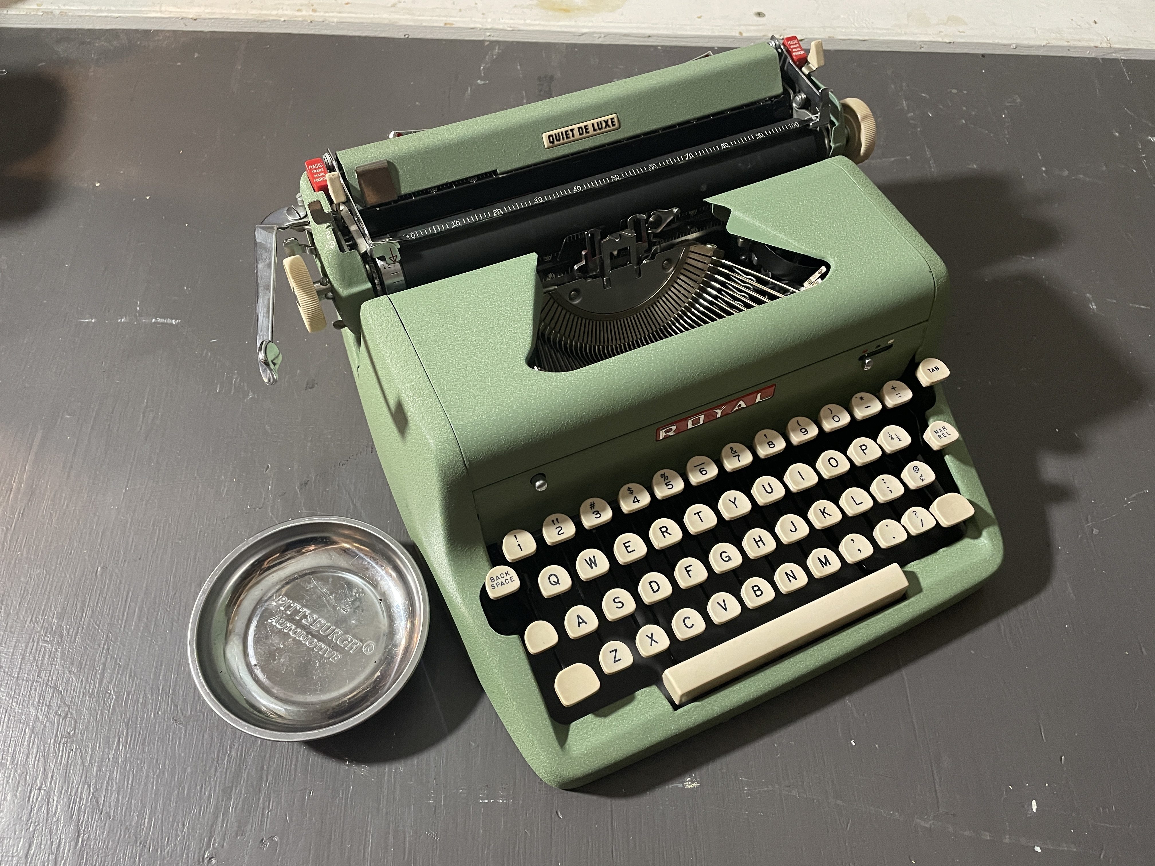 1957 Royal Quiet De Luxe with repair of broken shift and shift lock keys on left