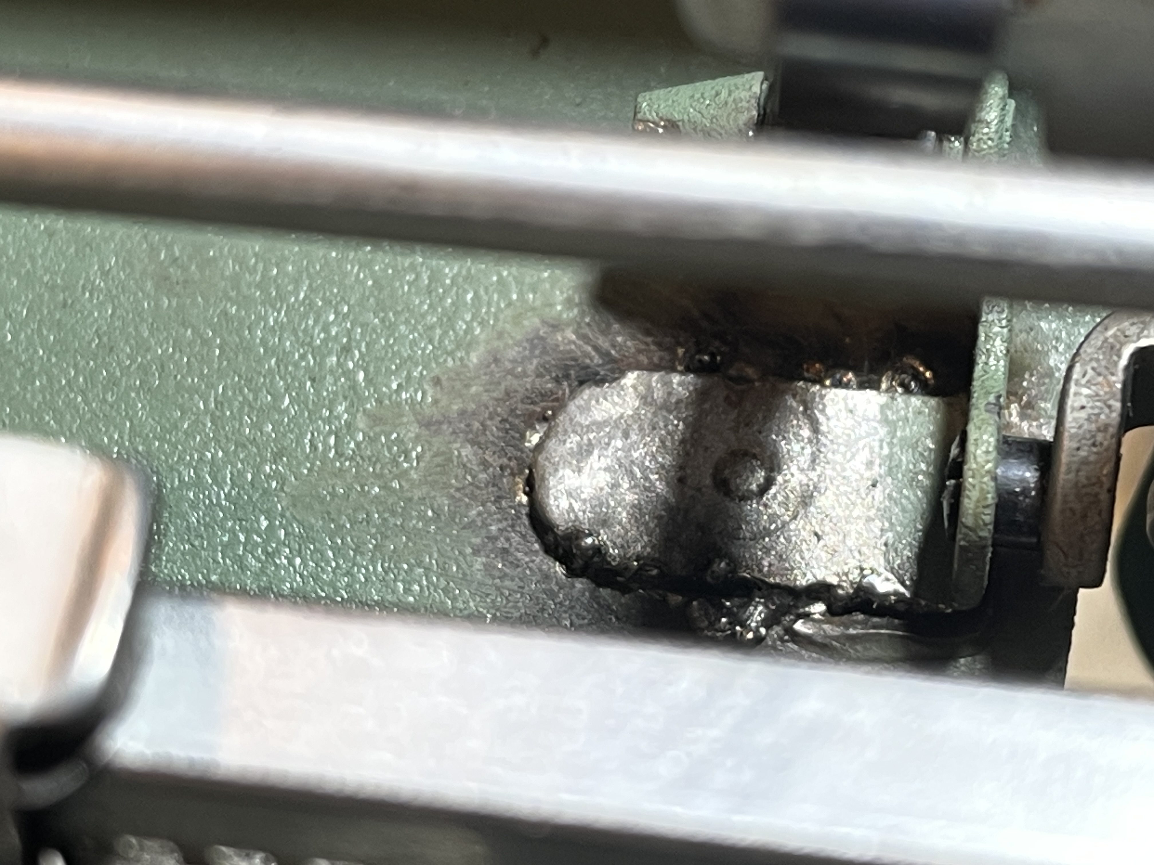 repaired cover plate on 1957 Royal Quiet De Luxe