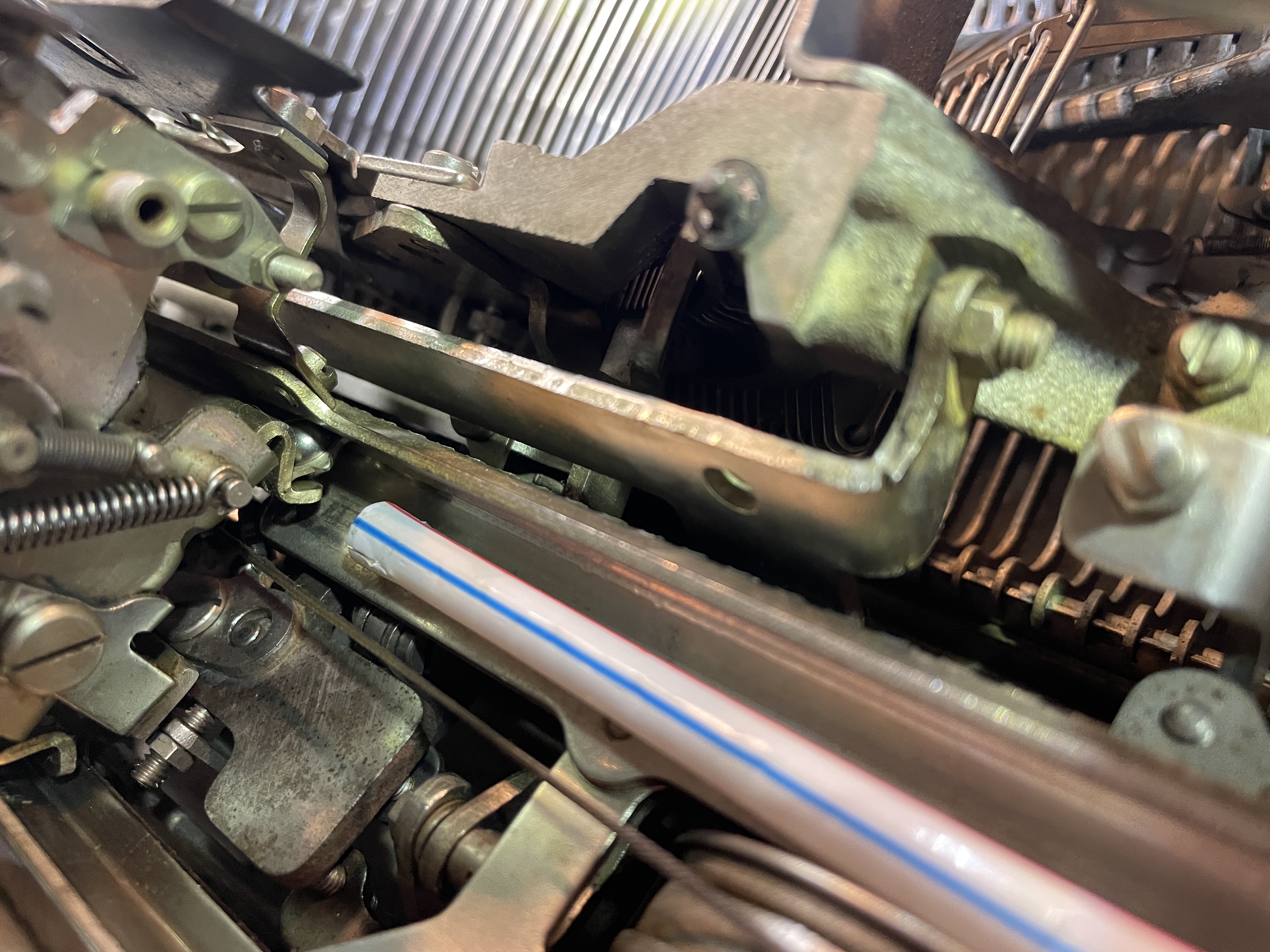 1949 Remington All-New Portable - placing pinion and bearing on carriage rail
