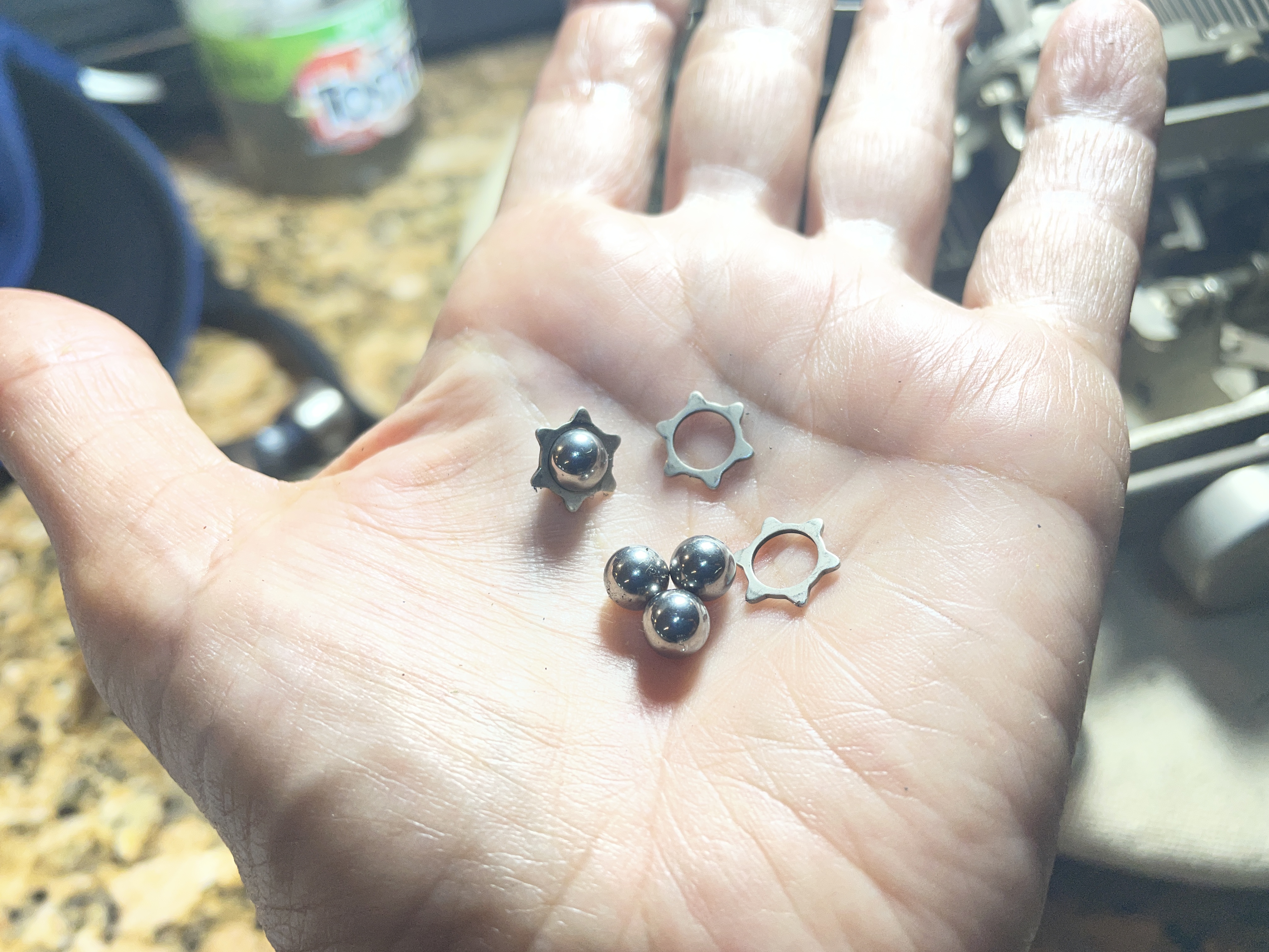 1949 Remington All-New Portable carriage bearing and pinion retainers