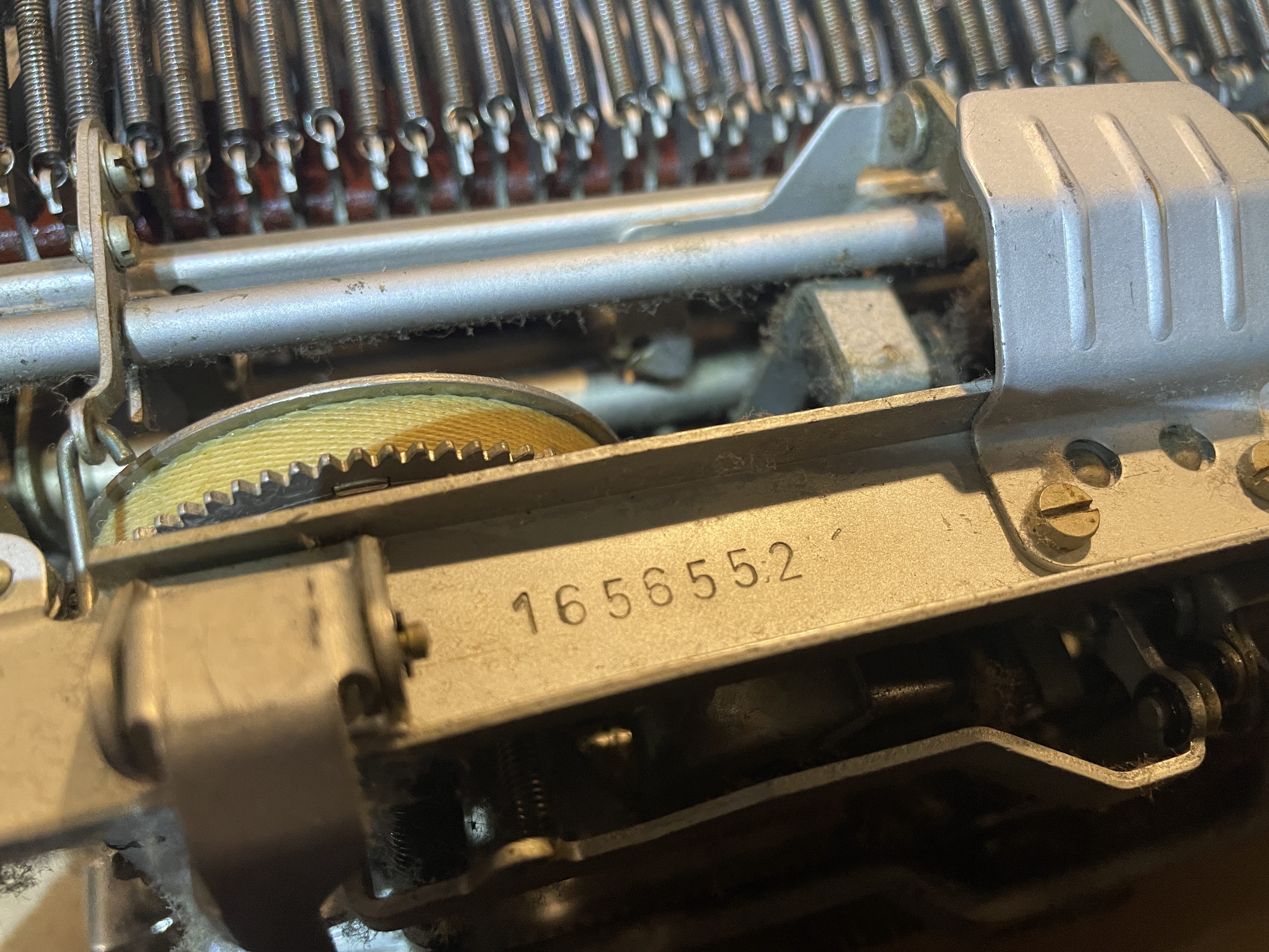 serial number stamped on bottom frame of Olympia SM4