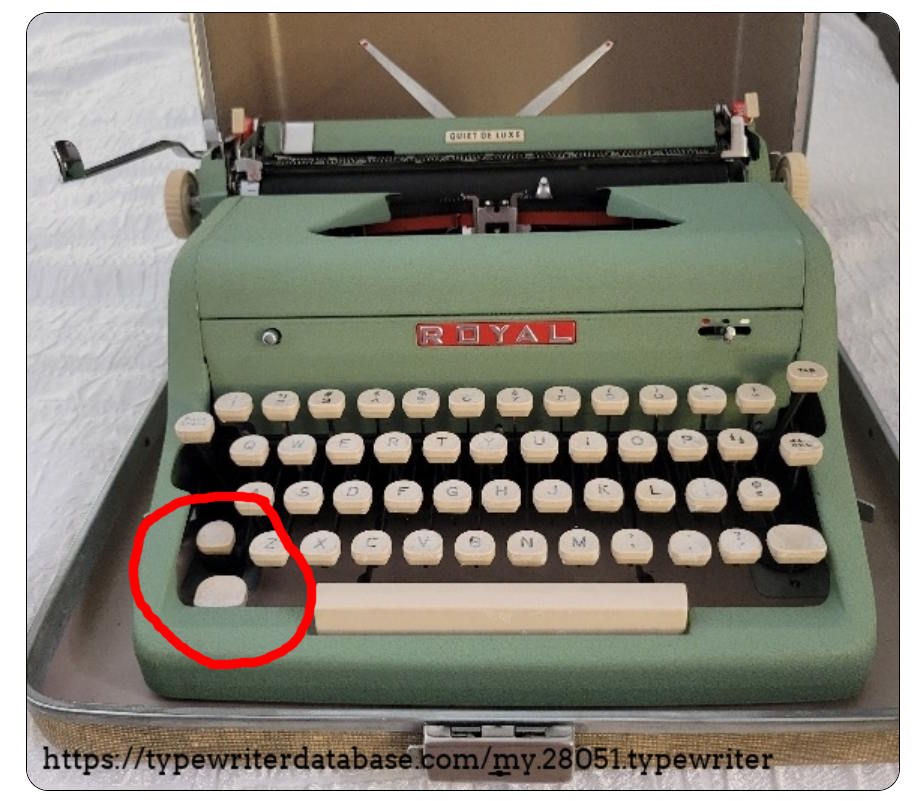 1957 Royal Quiet De Luxe with broken shift and shift lock keys on left