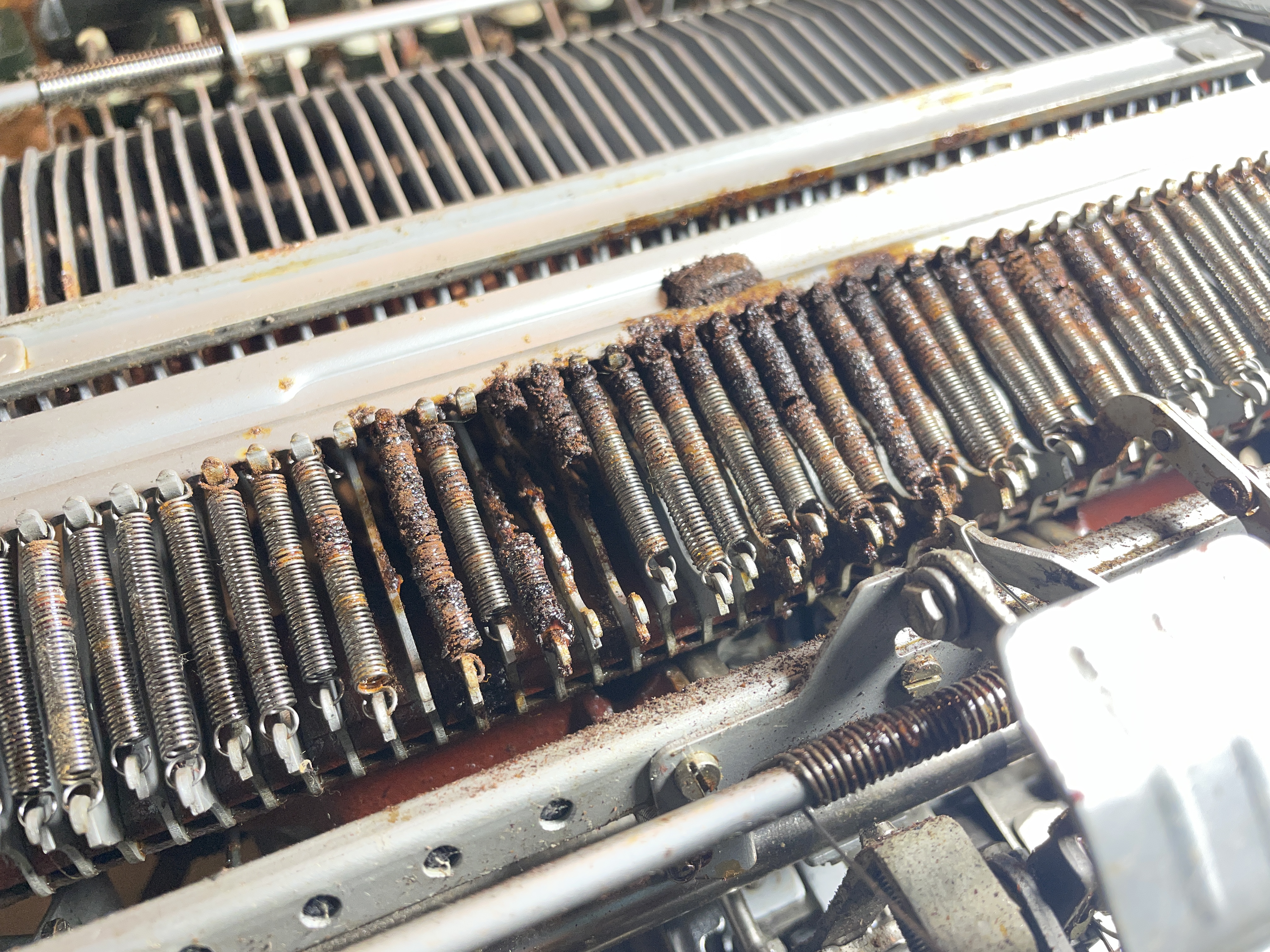 rusty tensioner springs on 1957 Olympia SM3 typewriter