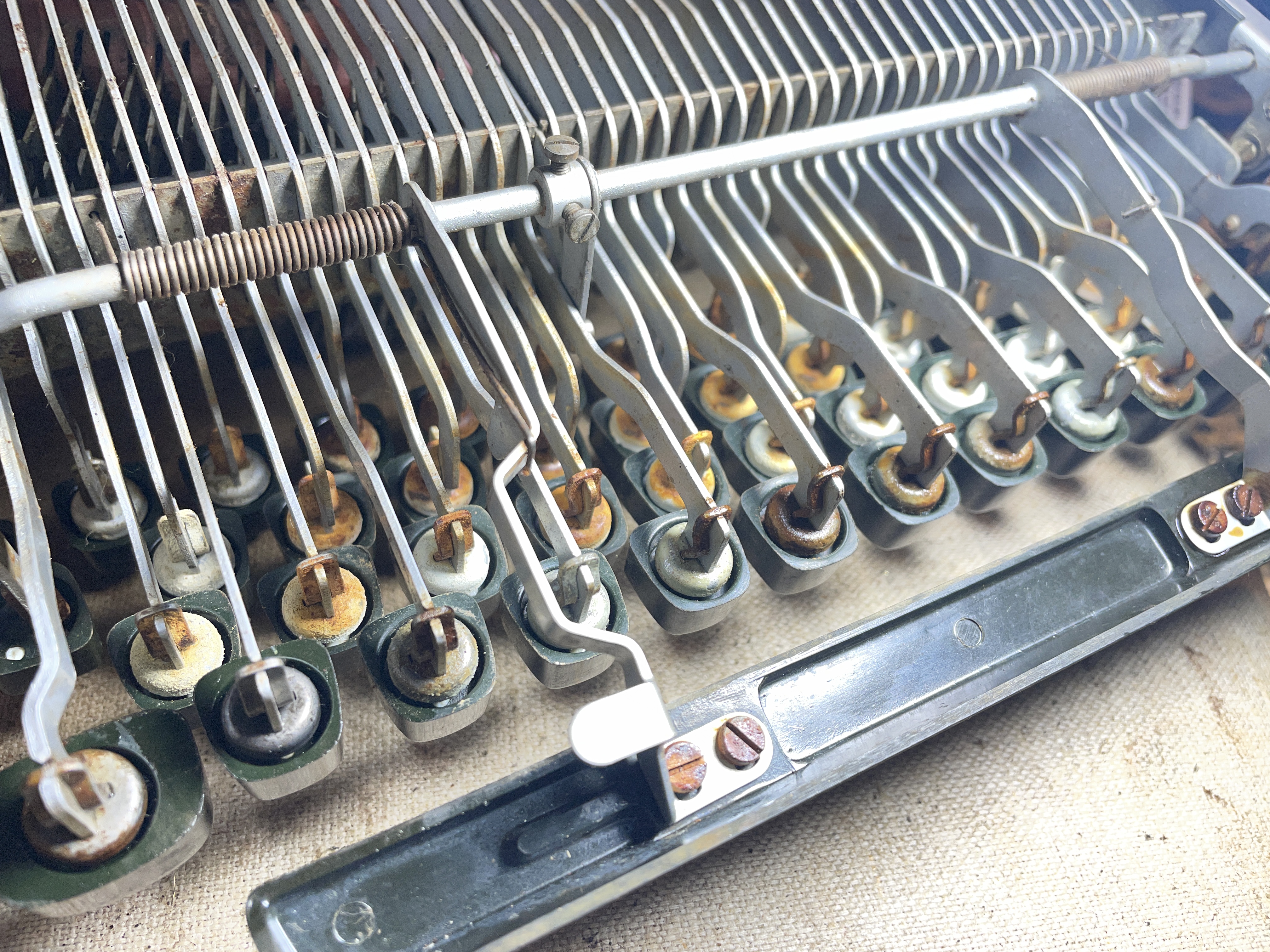 corroded and rusty cushioned keytops on 1957 Olympia SM3 typewriter